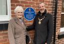 Val Young MBE, longest serving trustee, and Knutsford mayor Cllr Peter Coan unveil a blue plaque to honour philanthropist Marjorie Hurst