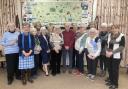 Goostrey villagers at the unveiling of a tapestry to commemorate the Coronation of King Charles