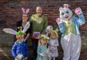 From left, Julia Chard, Knutsford mayor Cllr Peter Coan  and the Easter bunny with winners of the Easter bonnet competition