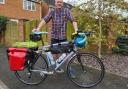 Cyclist Dave Evans packs his bike ready to ride from Lands  End to John O'Groats