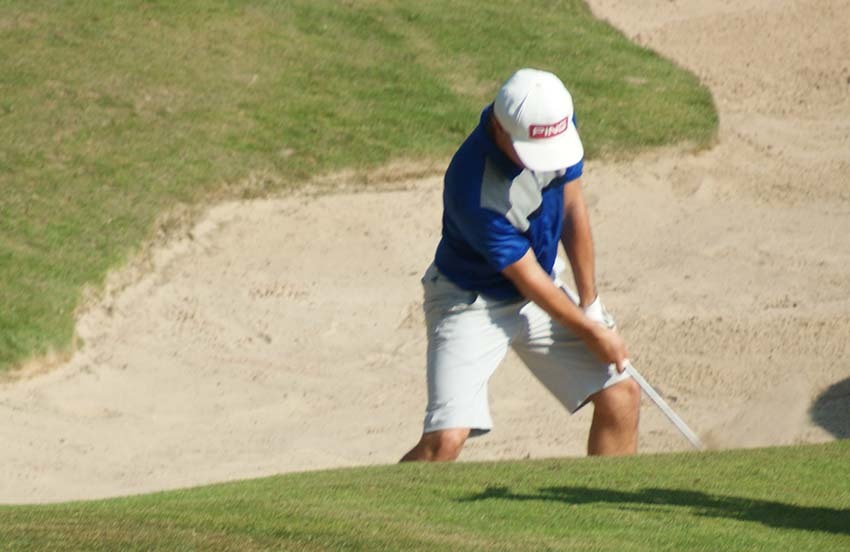 Sam Johnson plays out of a bunker during the Hunter Trophy final