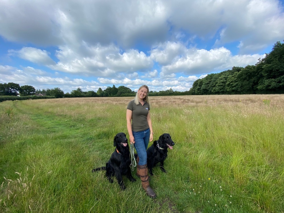 Charlotte Smith with her two retrievers Chance and Whisper