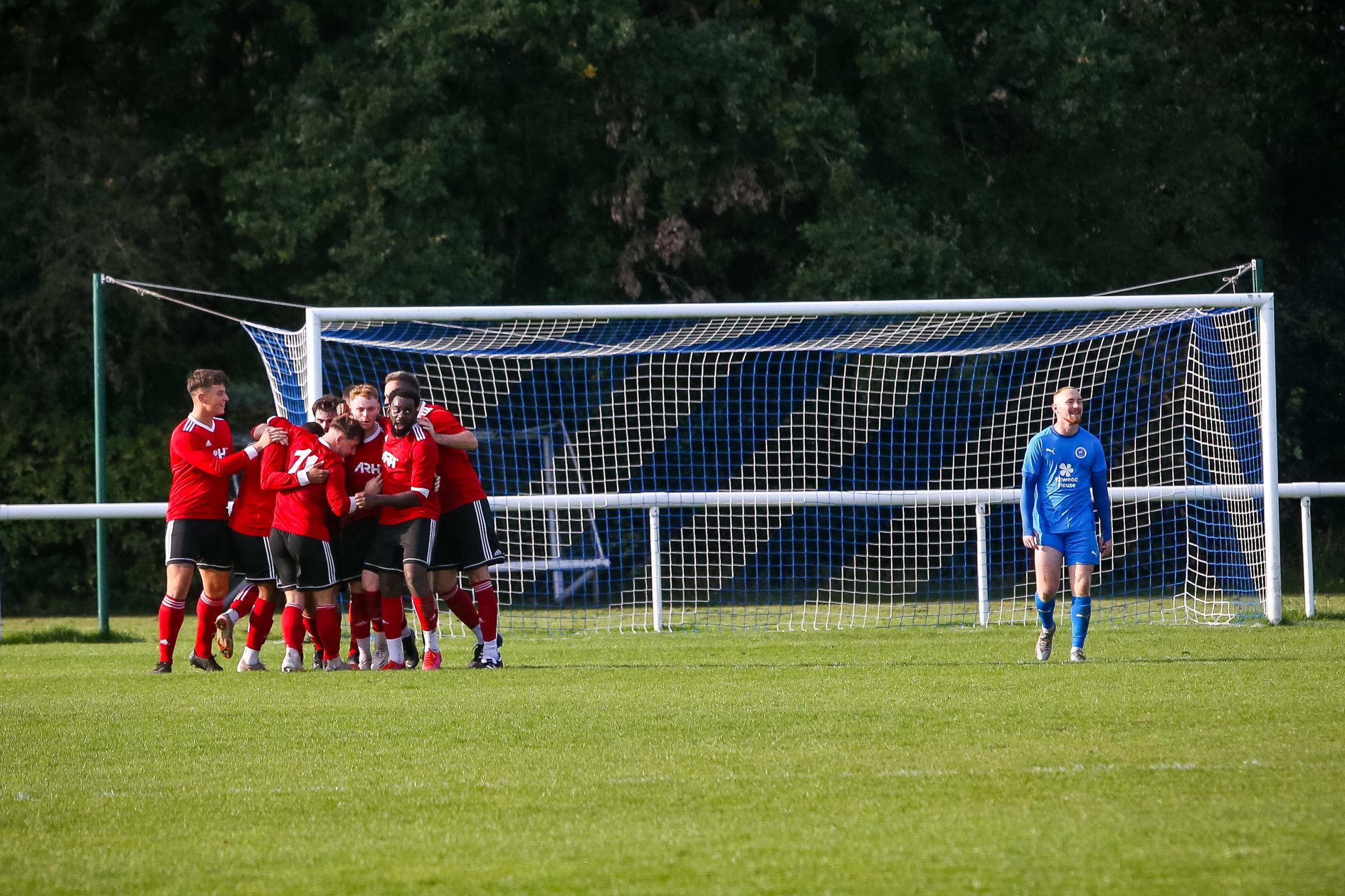 The celebrations that followed Markell Bennetts goal for Knutsford at Lostock Gralam. Picture by Karl Brooks Photography