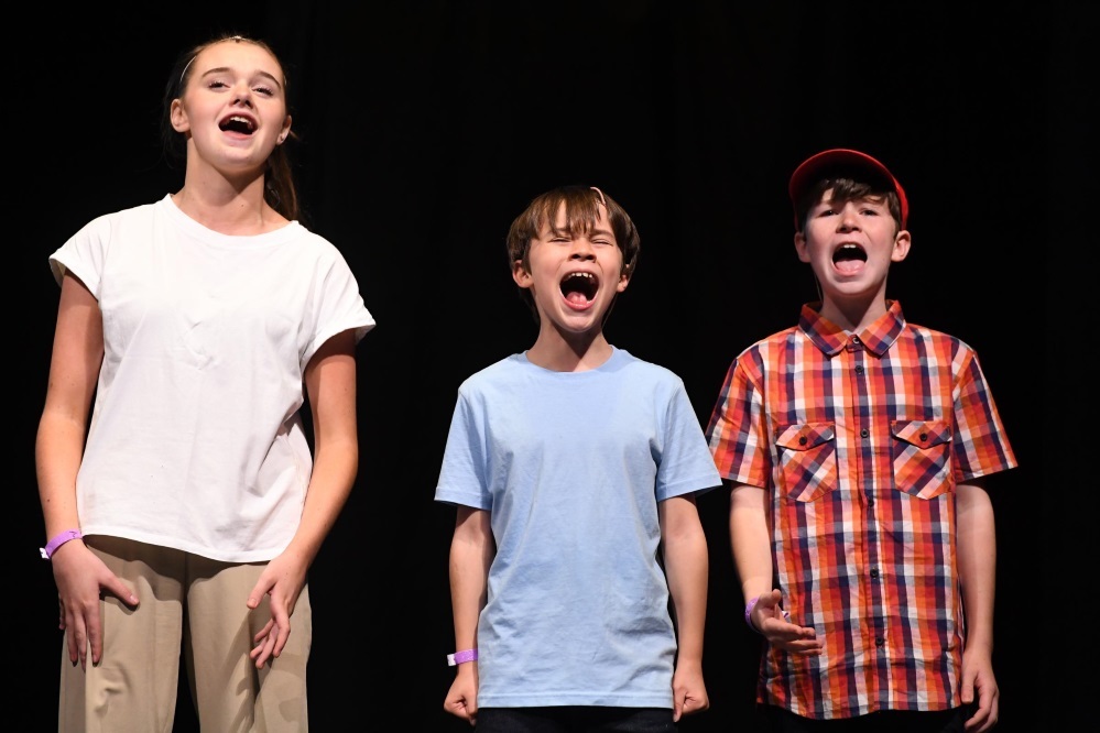 Helena McLaughlin, 19, Jack Sheran, 10 and Thomas Ryan, 12, performing a medley from Come From Away in the West End
