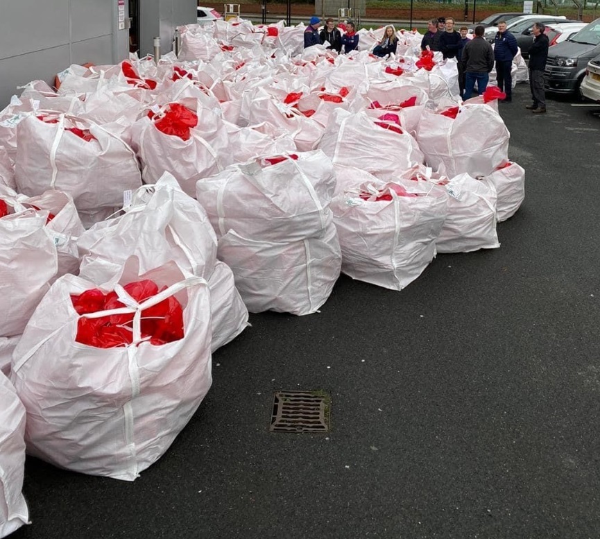 This is just a quarter of the gift sacks filled by volunteers