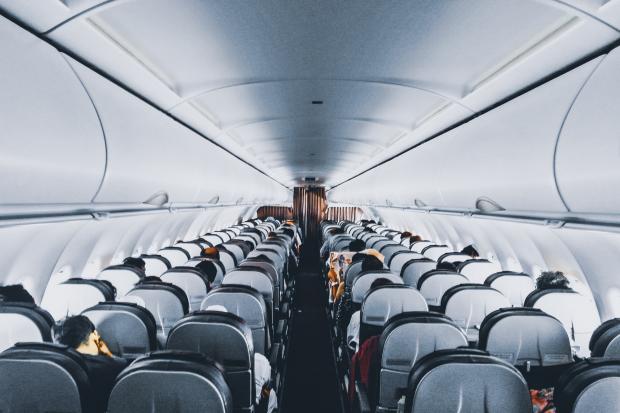 Knutsford Guardian: Rows and rows of plane seats. Credit: Canva