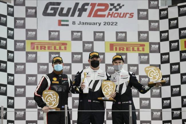 Iain Campbell, Jamie Clarke and Oli Webb celebrate victory in their Greystone GT McLaren 570S GT4, Gulf 12 Hours at Yas Marina in United Arab Emirate. Picture: JEP