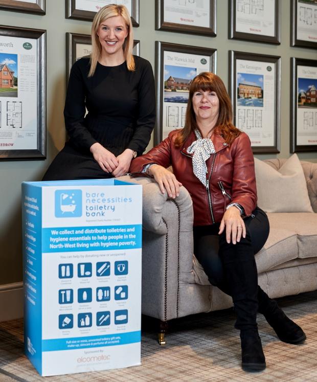 Knutsford Guardian: Sarah Weaver and Wendy Hobson with the new collection box at the Redrow development in Knutsford