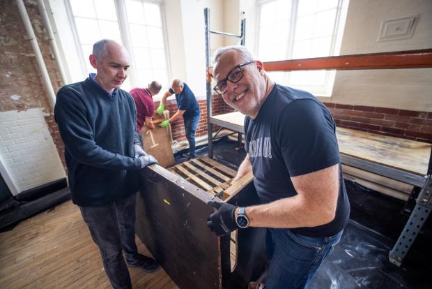 Knutsford Guardian: Andrew Malloy and Stephen Edmondson build the bar stacking
