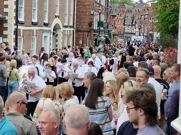 Knutsford Guardian: Brass bands accompanied the procession