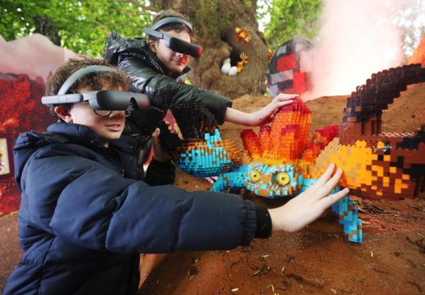 Knutsford Guardian: Lucca and Sonny using the eSight eyewear as they explored the Magical Forest (LEGOLAND Windsor)