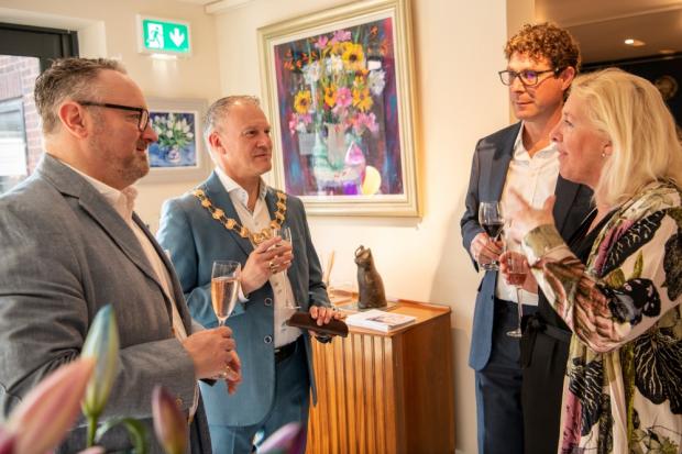 Knutsford Guardian: Outgoing mayor Cllr Stewart Gardiner, second from left, consort Simon Hutchence, Ben Aardewerk and Holly Johnson at the prevew eveninig