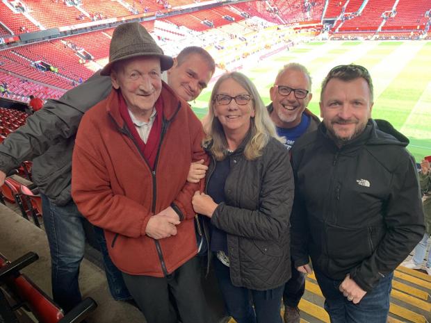 Knutsford Guardian: Grandad George and family on a visit to Old Trafford
