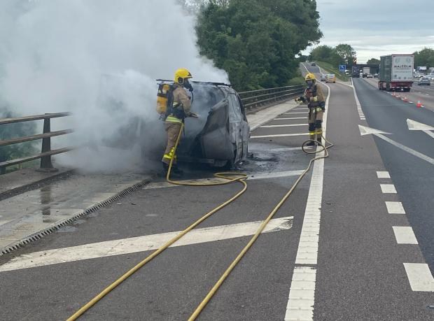 Knutsford Guardian: The van fire on the slip road of junction 18 on the M6