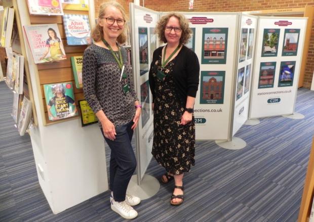 Knutsford Guardian: Librarians Debbie Wood and Paula Sawyer with the station art panel in Handforth Library 