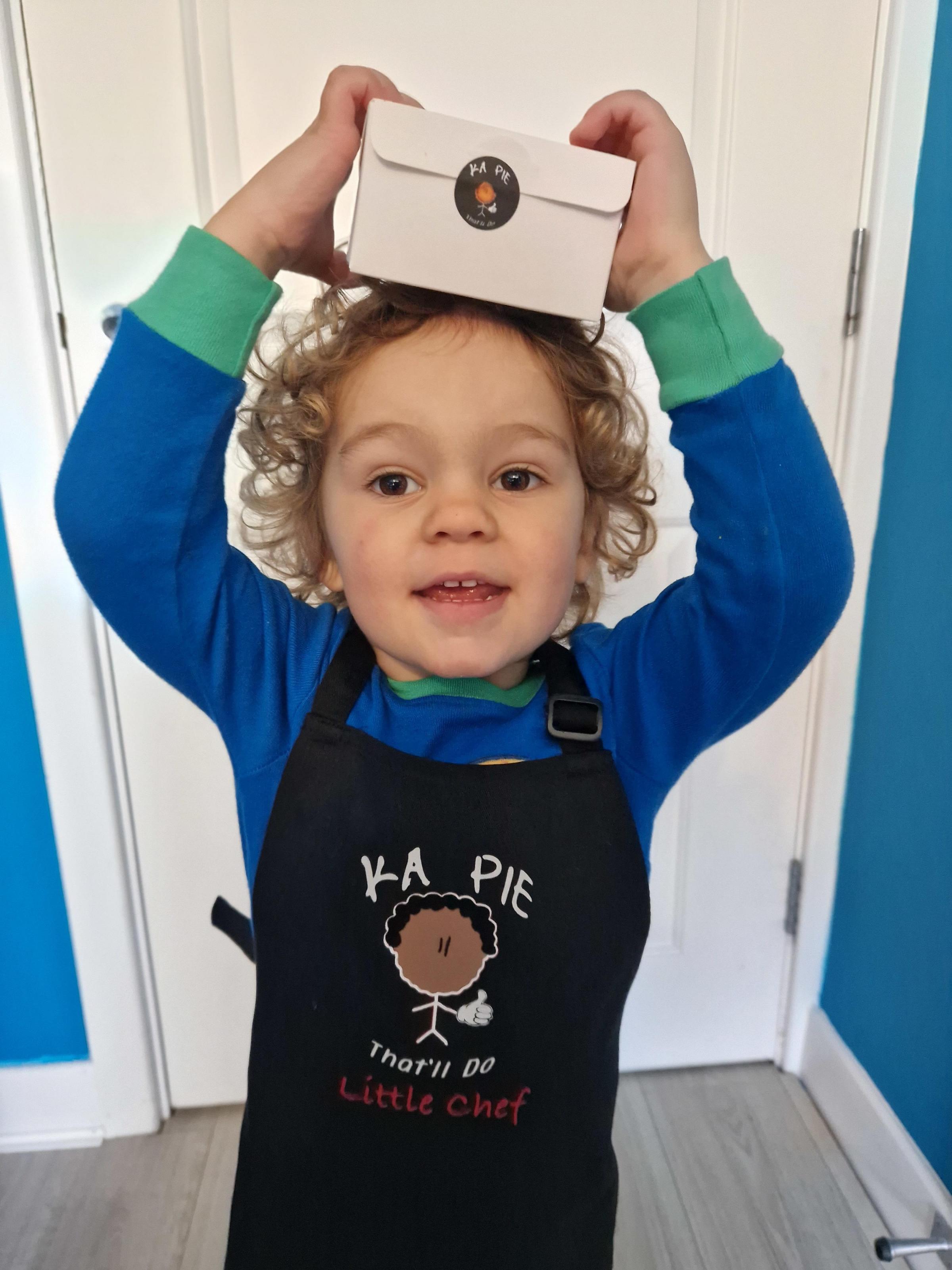 Three-and-a-half-year-old Lennon, who welcomes customers waiting to pick up dads pies