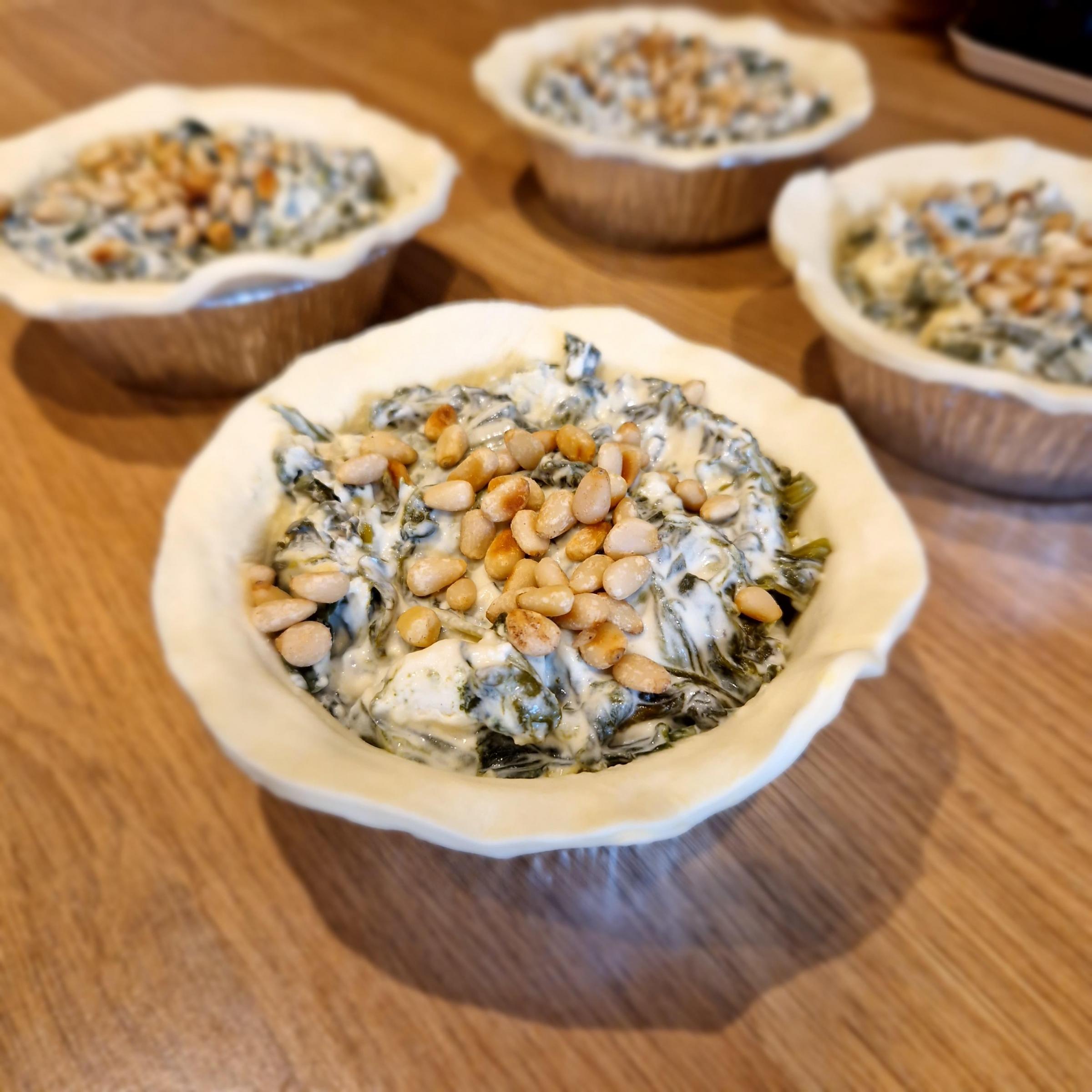 Pies filled with creamy feta, spinach and toasted pine nuts