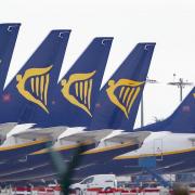 Ryanair planes lined up on a runway (PA)