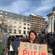 Tetyana Petrenko, a Cheshire doctor from Ukraine,  joins thousands of people at a protest in London