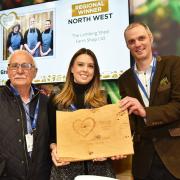 Michael Mitchell owner and Kathryn Mitchell director crowned 2022 north west regional winner at the Farm Shop & Deli Show by previous winner Andy Swinscoe from Courtyard Dariy