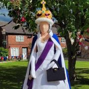 Holmes Chapel Community Yarn Bombers have created a  seven-foot figure of the Queen to celebrate her Platinum Jubilee