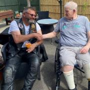 Michael Davies from The Bikers Church shares his passion for motorbikes with John Chrimes, a resident at The Willows