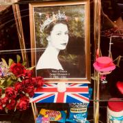 This photograph of the Queen at Mr Simms  Olde Sweet shop is one many royal tributes displayed by businesses in Knutsford  Pictures: John Horsley