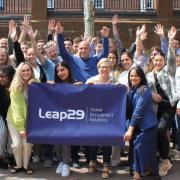 Employees celebrate after Leap29 is named one of the best companies to work for in the UK