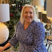 Holly Johnson will be greeting shoppers with champagne and mince pies at her antiques business in Knutsford
