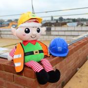Santa's elf is warning children to stay away from David Wilson Homes building sites during the Christmas holidays