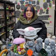 Ester Bradbury offers a wide selection of garden ornaments at her stall in Knutsford Market Hall