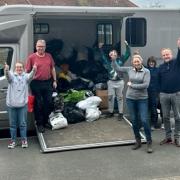 Nilgun Oneren, far left, with Mobberley parish Cllrs David Swan, fourth from left, Cllr Karen Baker, fourth from right, and villagers loading a horsebox with donations for Turkey