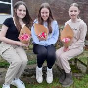 Ella Wilford, centre, this year's Goostrey Rose Queen, with, from left, attendants Nancy Napier and Eleanor Stutfield