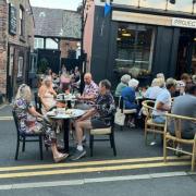 Businesses on Minshull Street called for the road to be closed to create a continental feel to help boost trade