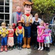 Fancy dress entrants with Knutsford deputy mayor Cllr Colin Banks and Julia Chard, owner of Knutsford Olde Sweeet Shoppe
