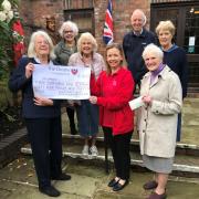 From left, Pat Heath, Jenny Want, Teresa Stringer, Louise Dawson, Clive Heath, Valerie Young and Heather Eddowes at the cheque presentation held at Knutsford Heritage Centre
