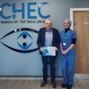 Patient Gordon Thompson with Erin Broad, manager of Stockport Hospital, after his successful cataract surgery