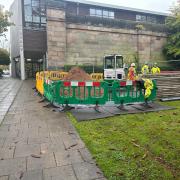 Work being carried out in library gardens is part of the ongoing repair to the sink hole on Toft Road
