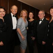 From left, Rachael Taylor, Charlie Ross, Gill Bevin, Lucy Thompson, David Ireland and Judy Bailey at the Mere Ball in 2013
