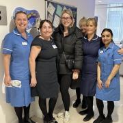 Breast cancer survivor Kirsty Snape, centre, thanks Christie staff for saving her life
