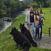 Richard McGrorey with wife Mel, sons Thomas and Alex, and their dogs