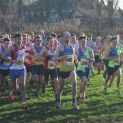 Richard Coen, centre in vest number 448, was first to finish for Wilmslow Running Club in the Cheshire Cross Country Championships senior men's race