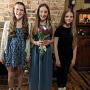 Rosalie Tarne new Mobberley Rose Queen, centre, with, from left, ladies in waiting Daisy Buckley and Martha McCloskey-Brennan