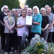 Staff and patients at Tabley House celebrate gaining top 20 recognition