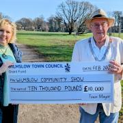Angela McPake, chairman Wilmslow show committee receives £10k grant from Wilmslow town mayor Cllr Jon Newell