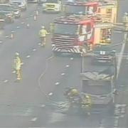 Firefighters are tackling a van fire on the northbound M6 in Cheshire