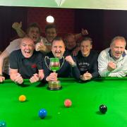 Wilmslow Cons A celebrate winning the Team Knockout competition