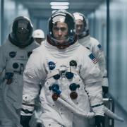 Lukas Haas as Michael Collins, Ryan Gosling as Neil Armstrong and Corey Stoll as Buzz Aldrin
