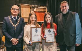 Twin sisters Liv and Jess Johnson receive the Youth Award from mayor Cllr Mike Houghton, left, and Ian Cass, managing director of the Forum of Private Business