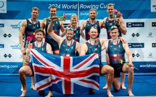 Tom Ford and his Great Britain men's eight crewmates celebrate with their gold medals